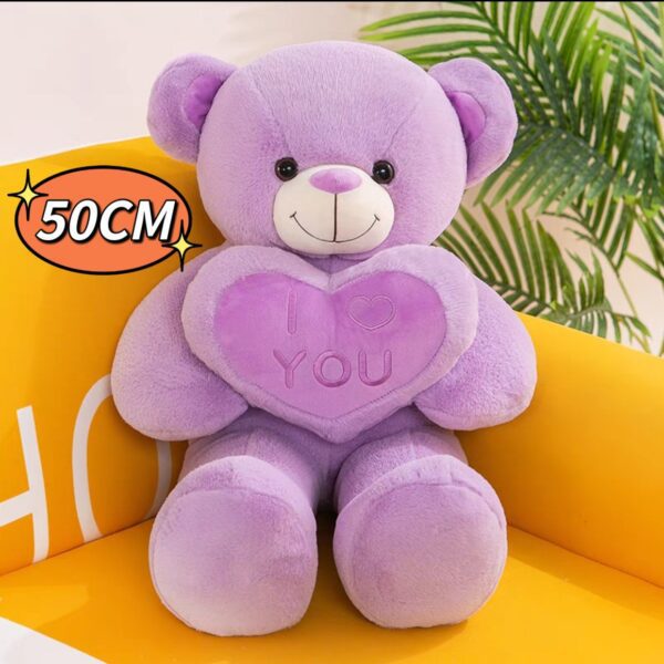 Oso con corazón violeta