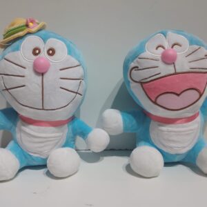 Gato celeste con moño rosa 20cm