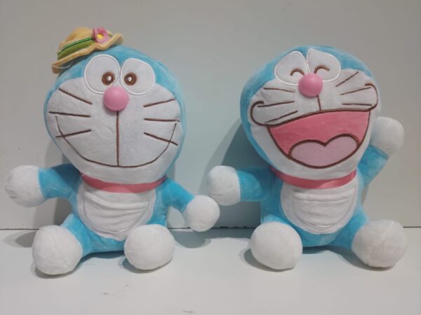 Gato celeste con moño rosa 20cm