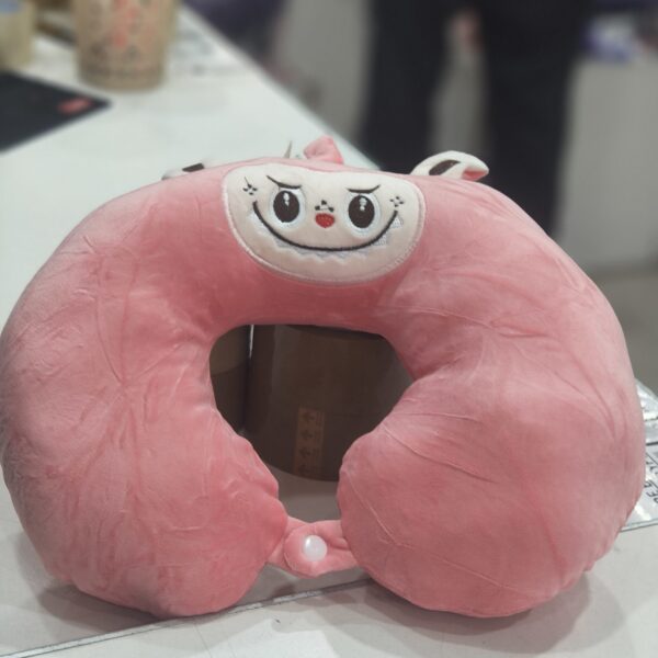 Labubu rosa almohada viaje