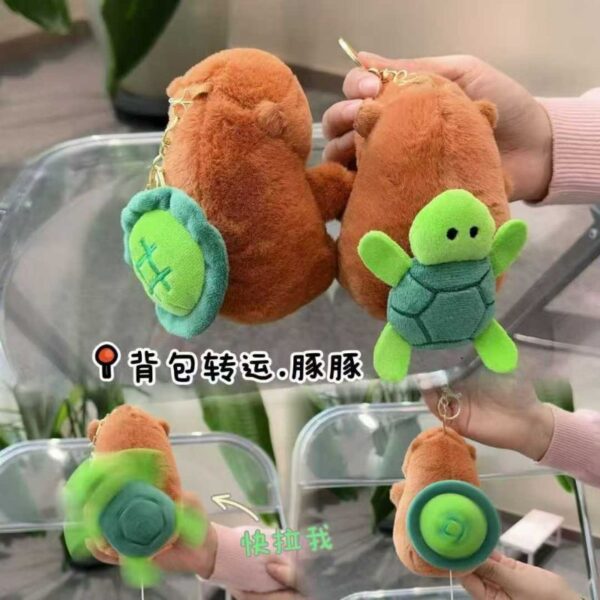 LLAVERO CAPIBARA CON TORTUGA QUE GIRA