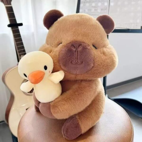 CAPIBARA CON PATO 20CM